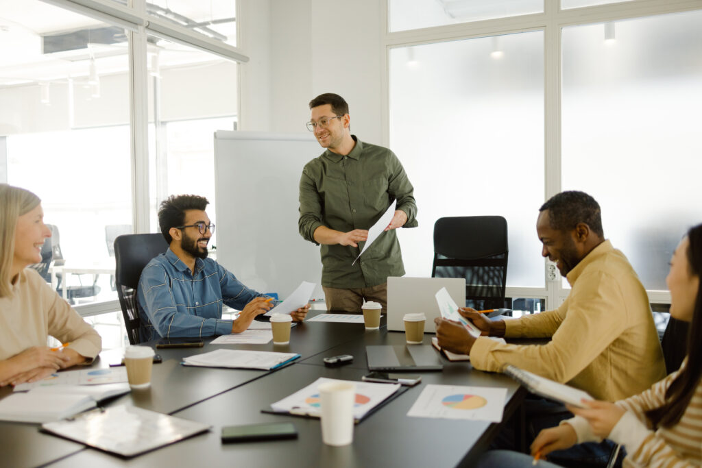 A team of professionals collaborating during a meeting in a modern office.