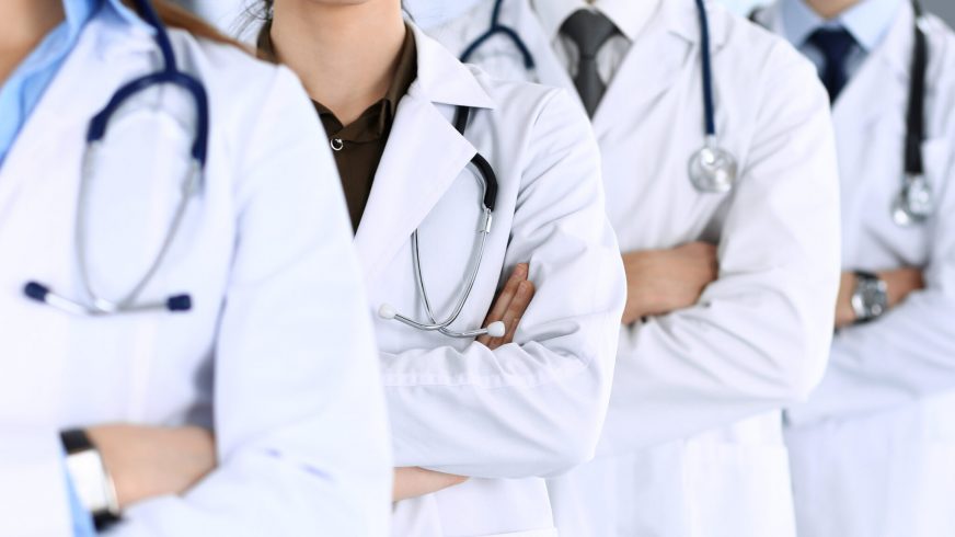 Group of doctors with arms crossed